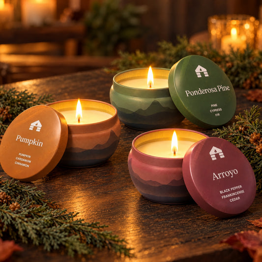 pumpkin spice, pine and amber arroyo scented candle tins from bluecorn on a fall decor thanksgiving tablescape