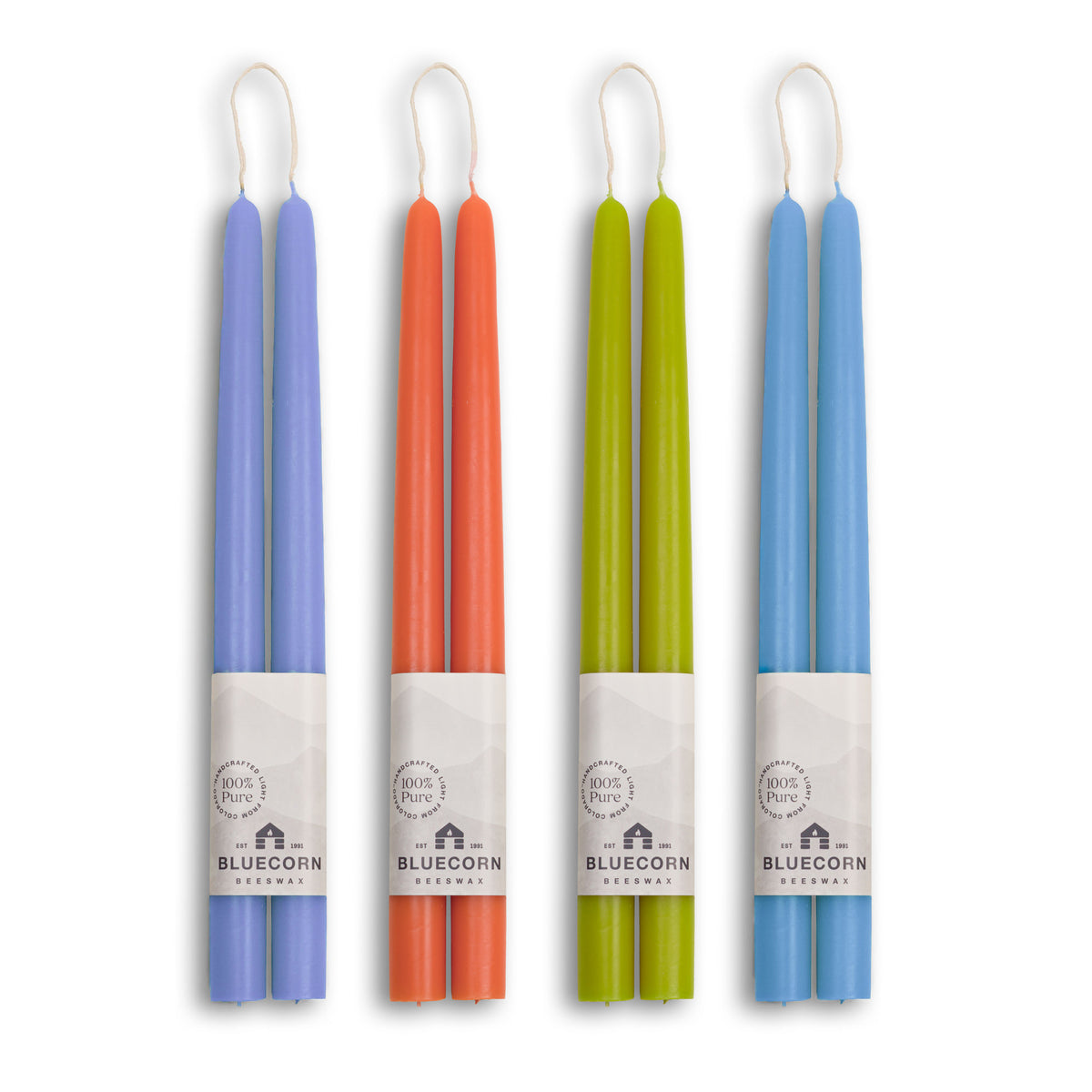 Colorful Summer Beeswax Taper Candle Bundle in Lilac, Sky Blue, Apricot, and Pistachio for vibrant table settings.