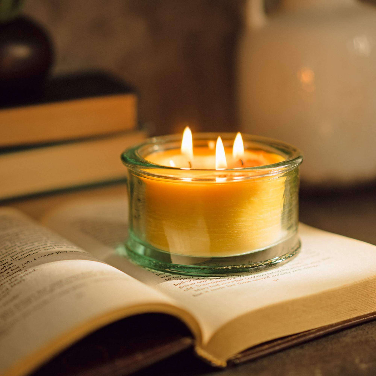 3-wick pure beeswax candle burning 