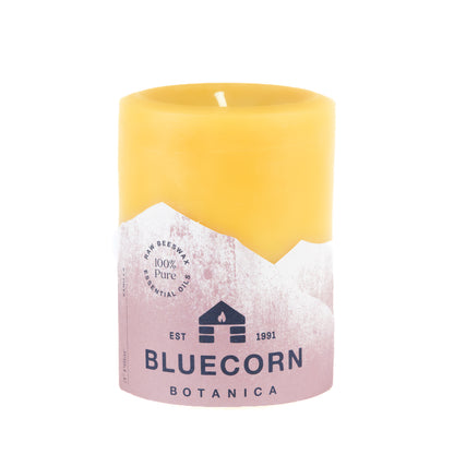 Clearance Vanilla scented 3" x 4" beeswax pillar candle with light brown label and white background