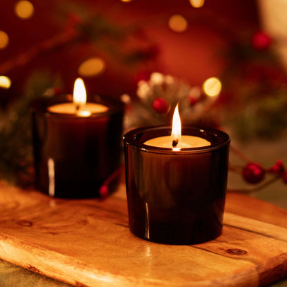 raw beeswax votive candles in dark amber votive candle holder