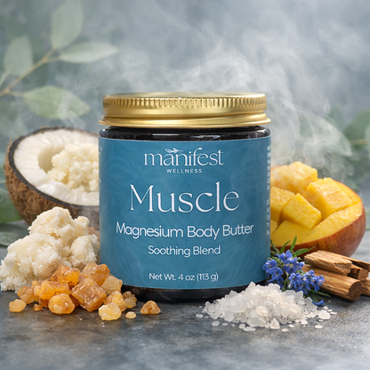 Magnesium muscle body butter styled with coconut, mango, shea butter, frankincense, blue tansy and magnesium salts.