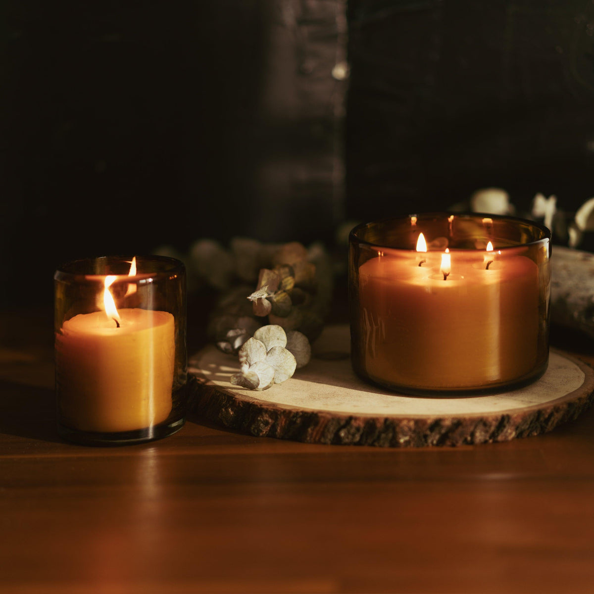 pure beeswax and essential oil scented candles in recycled blown glass candle holders from bluecorn beeswax candles
