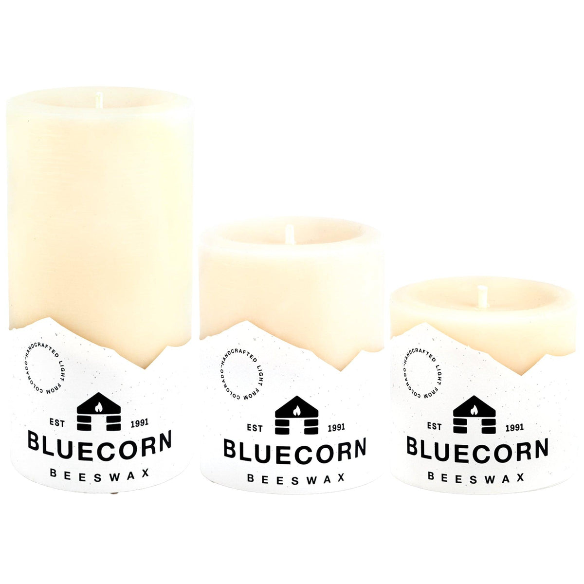 The Ivory Trio: three ivory beeswax pillar candles in 3, 4 and 6 inch heights
