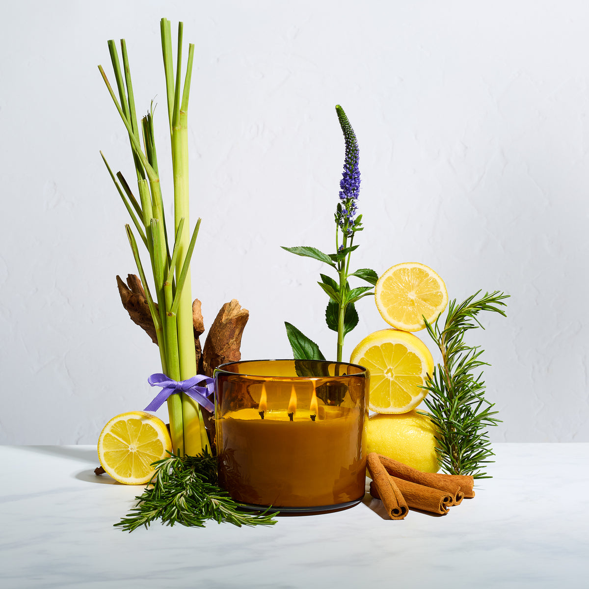 bluecorn beeswax candle in blown glass holder with seasonal spring style